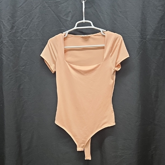 Vibrant Orange Short Sleeve Cut Out Bodysuit - Picture 1 of 15